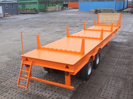 Chassis 60 tons with supports for transporting metal rods